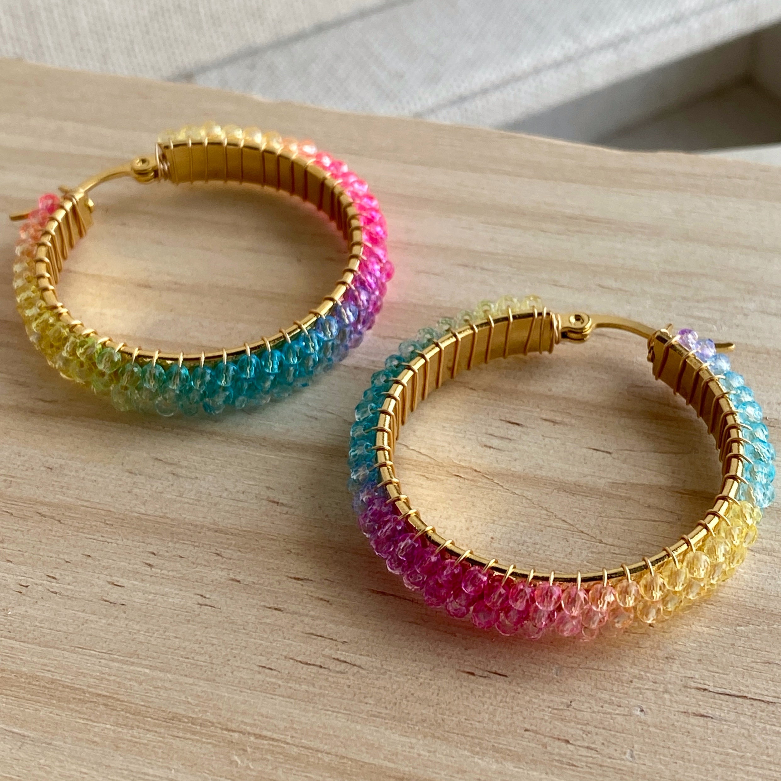 Rainbow beaded deals hoop earrings